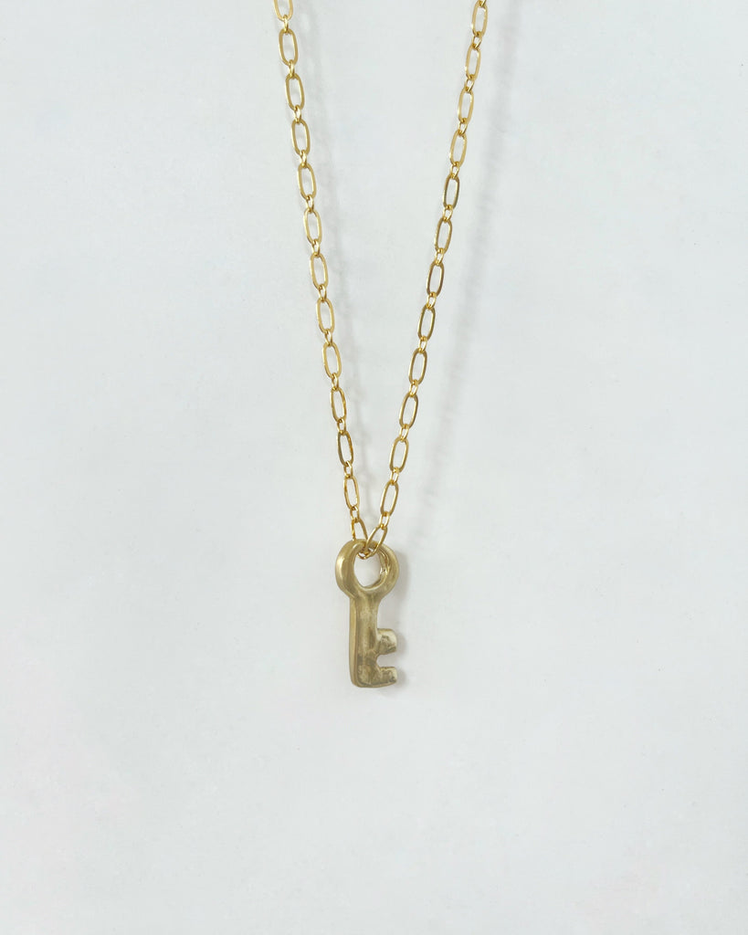Llave Pendant in Brass