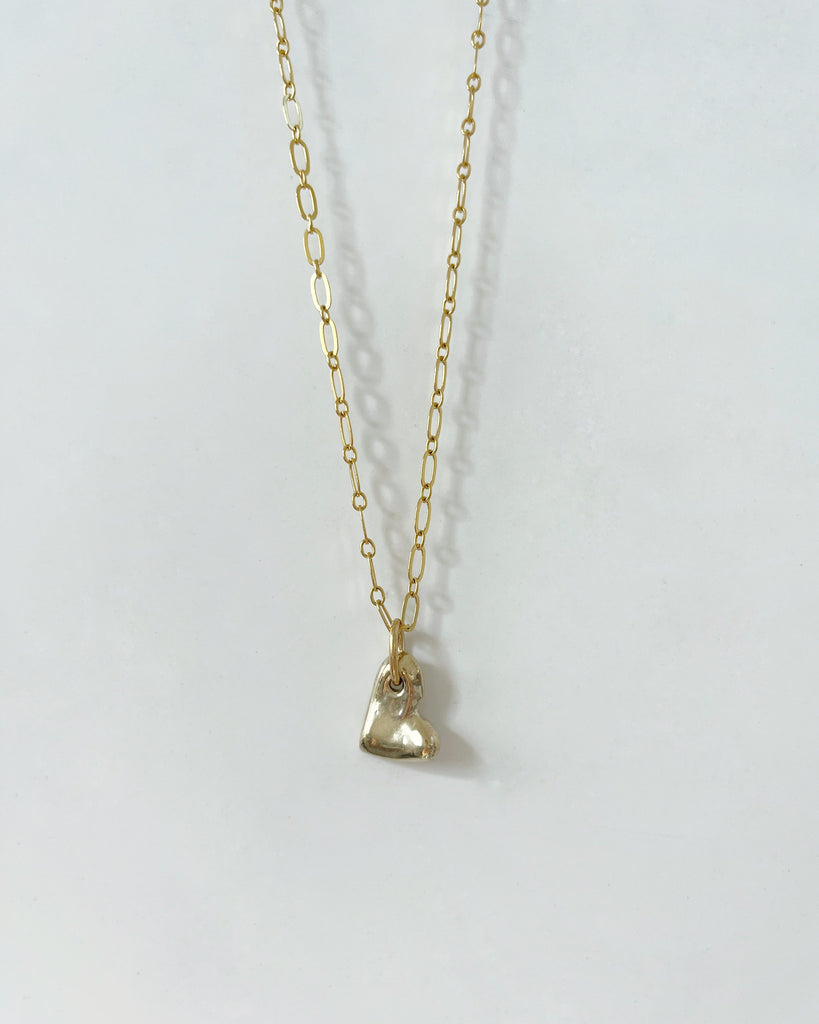 Amor Pendant in Brass